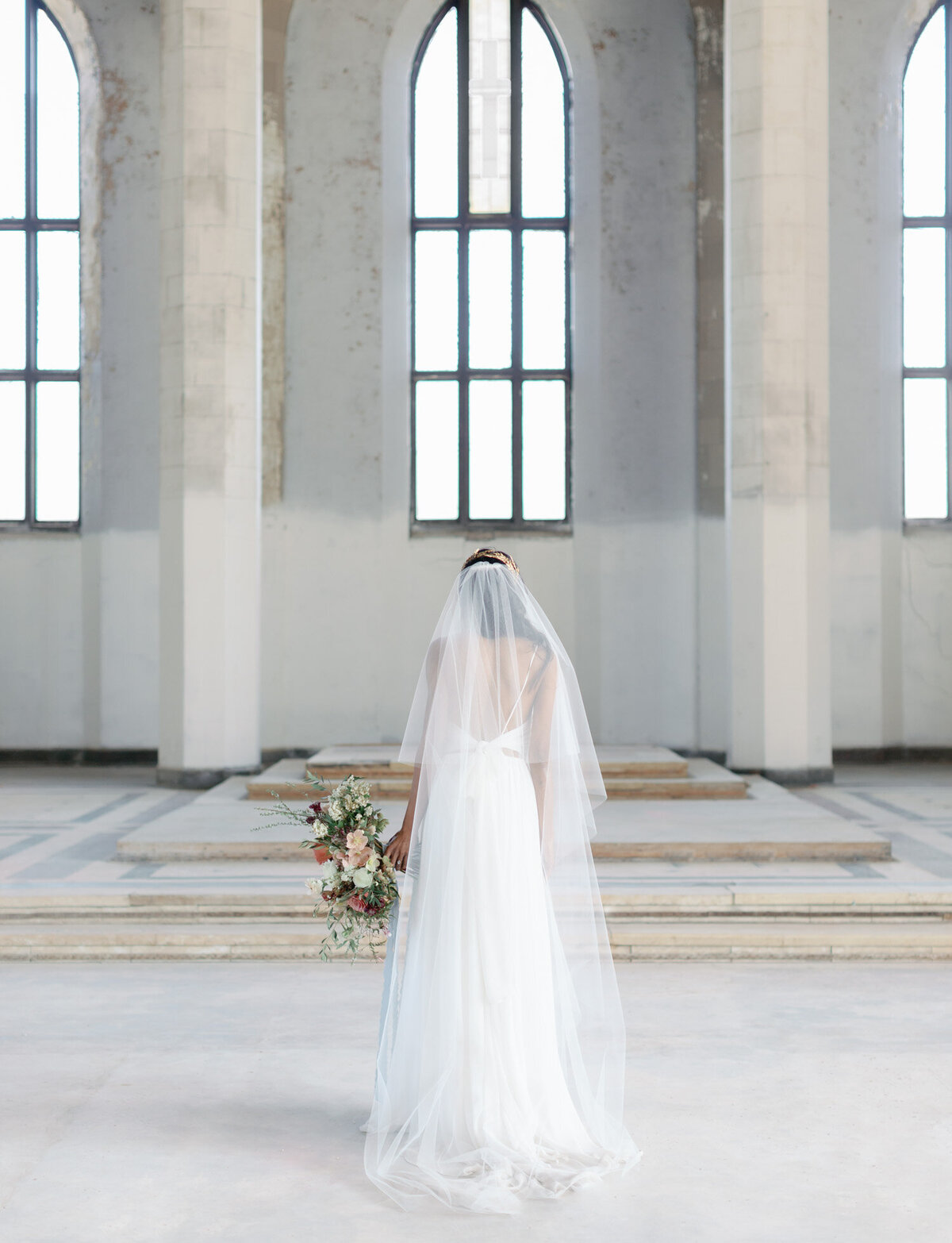 bride in long veil in cathedral ruins, Greece ancient wedding venue