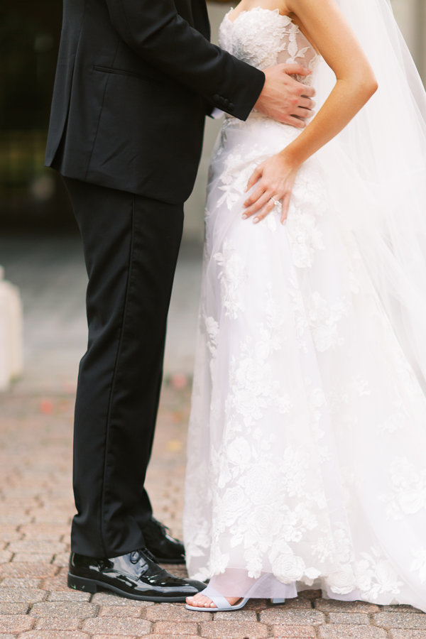 Bride-Groom-Detail-Shot-Black-Tux-White-Lace-Dress