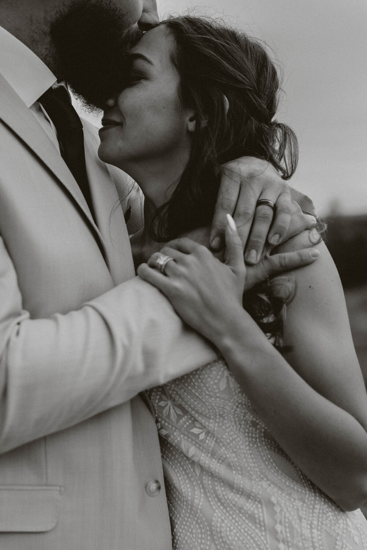 Montana Bride and Groom share hug during portraits 