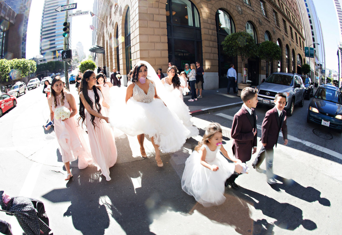 bridal party walking the streets of San Francisco