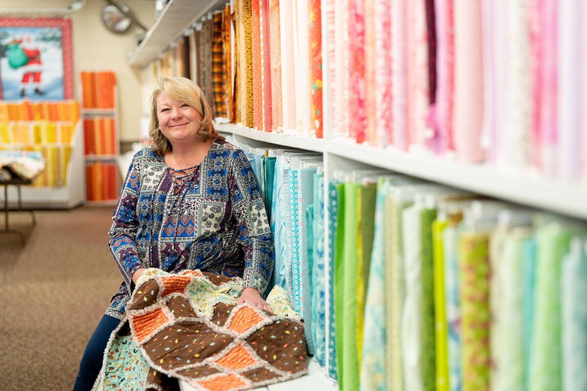 Woman who owns a quilting business