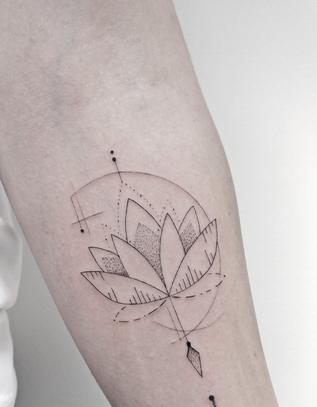 lotus tattoo, minimal tattoo, geometric tattoo, lotus tattoo
