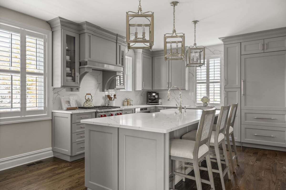 candra lynn interiors ocean port project kitchen with large island and wood floors