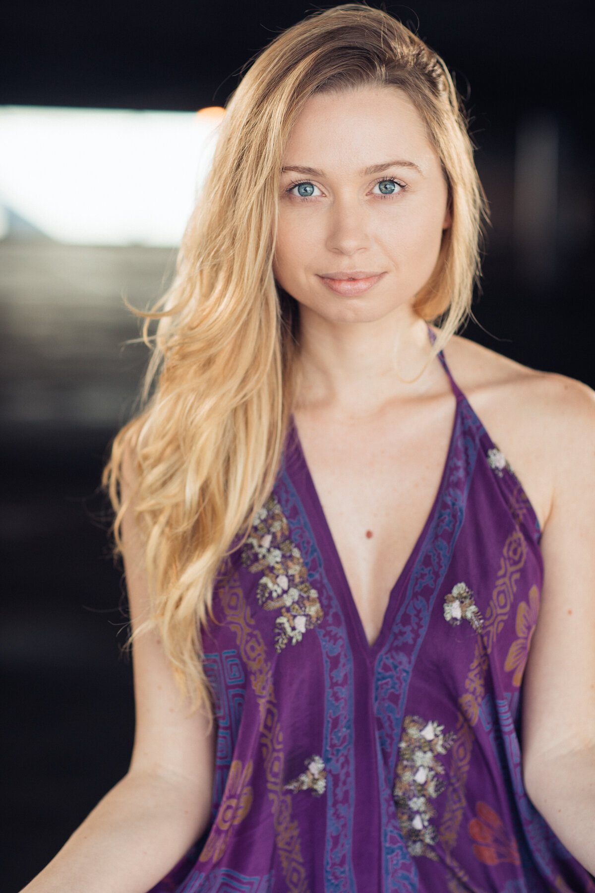Headshot Photograph Of Young Woman In Violet Sleeveless Los Angeles
