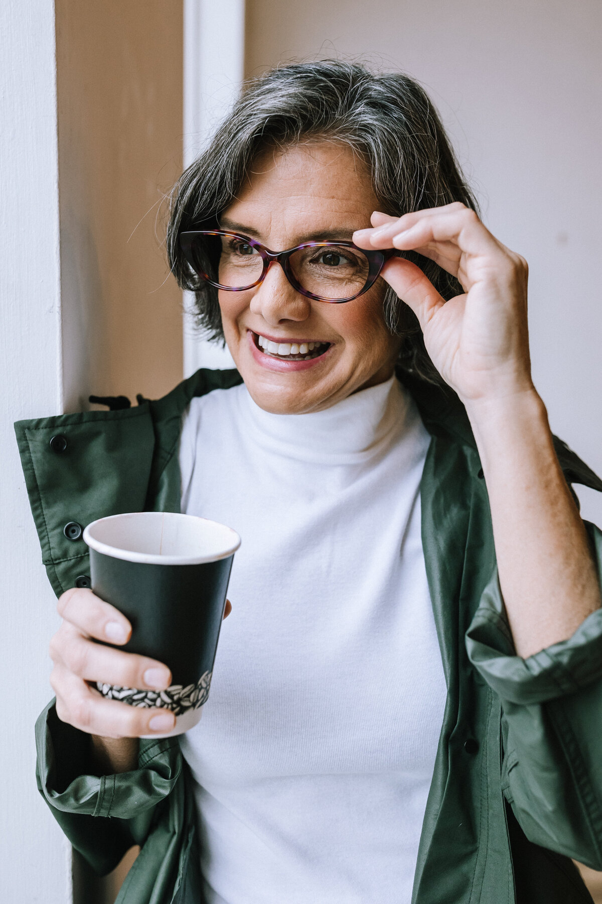 Woman wearing glasses for branding photos for North Point Eyewear of Pittsburgh. 