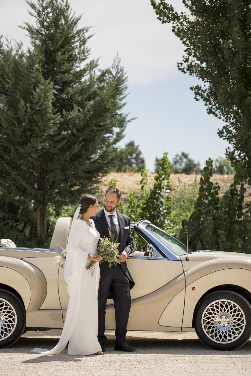 bride and groom in the car