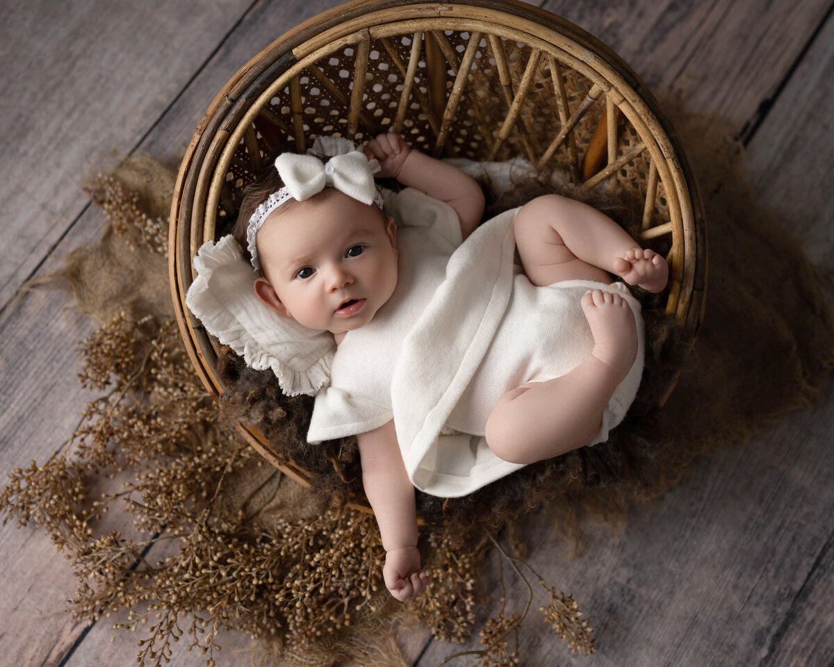 Newborn baby wooden bowl rustic prop Westlake professional photographer