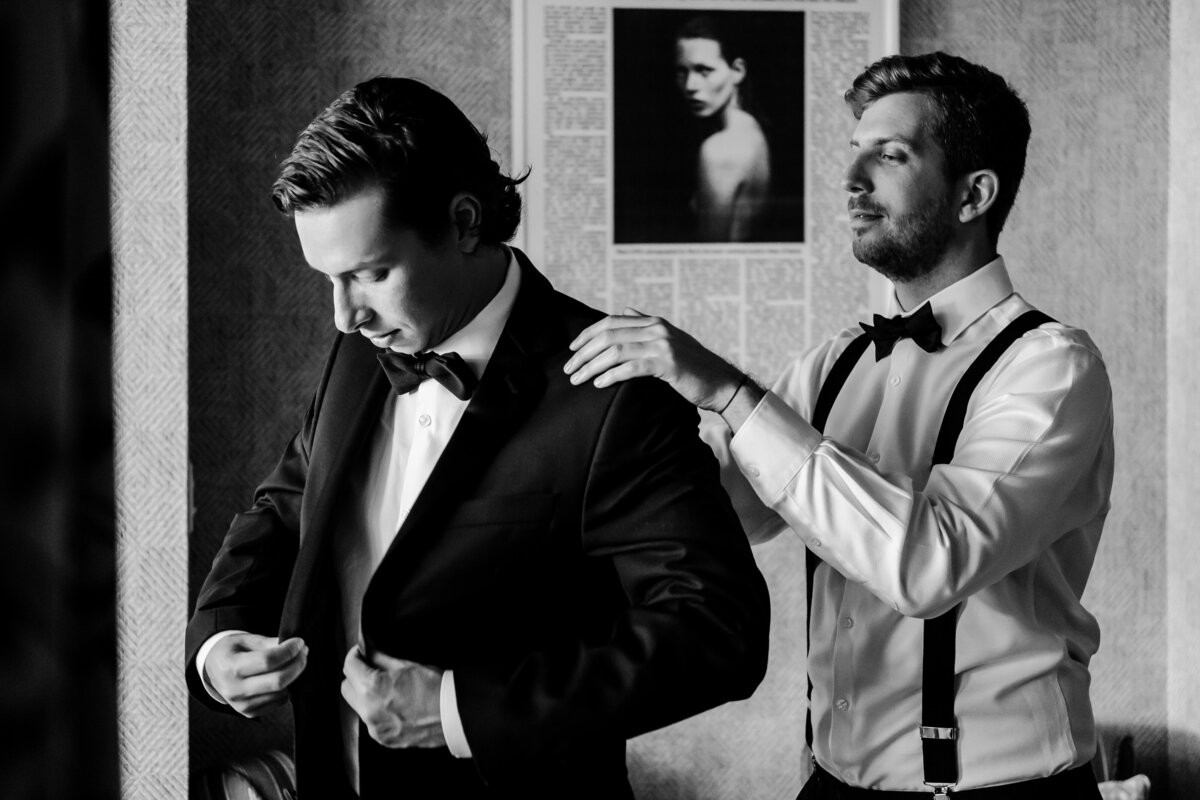 Groom being assisted by his Best Man as he gets ready for his Miami wedding ceremony