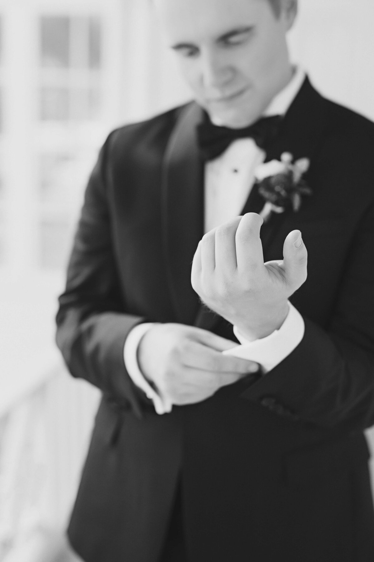 groom in classic tux for winter wedding