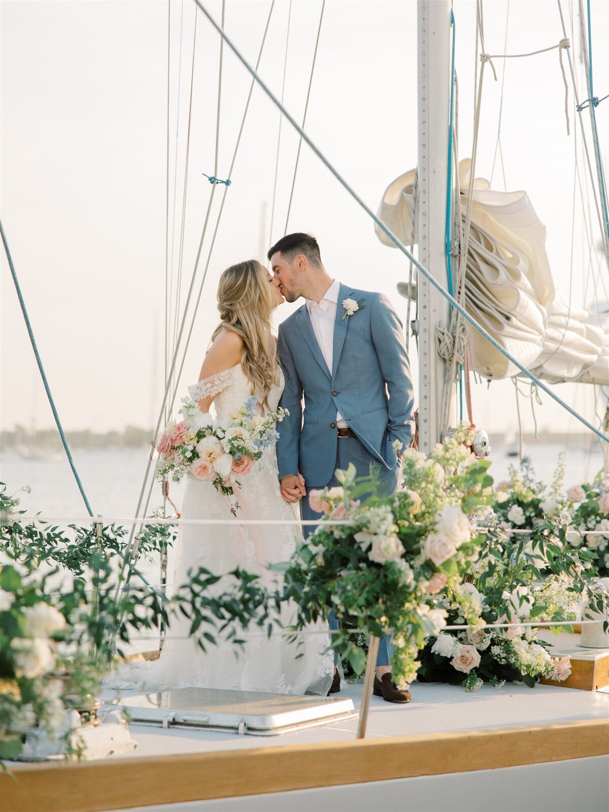Kate-Murtaugh-Events-wedding-planner-Newport-sailboat-elopement-bride-groom-greenery