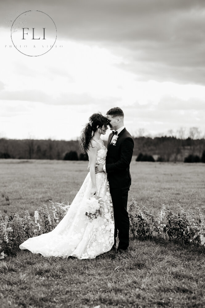 outdoor ceremony wedding photographer videographer floral gown 