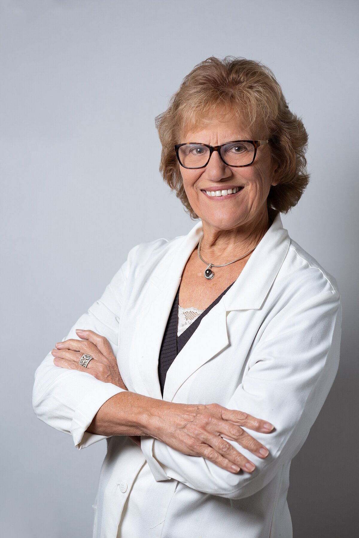 Dentist Headshot - Studio. Photo taken by Dripping Springs Texas based Lydia Teague Photography.