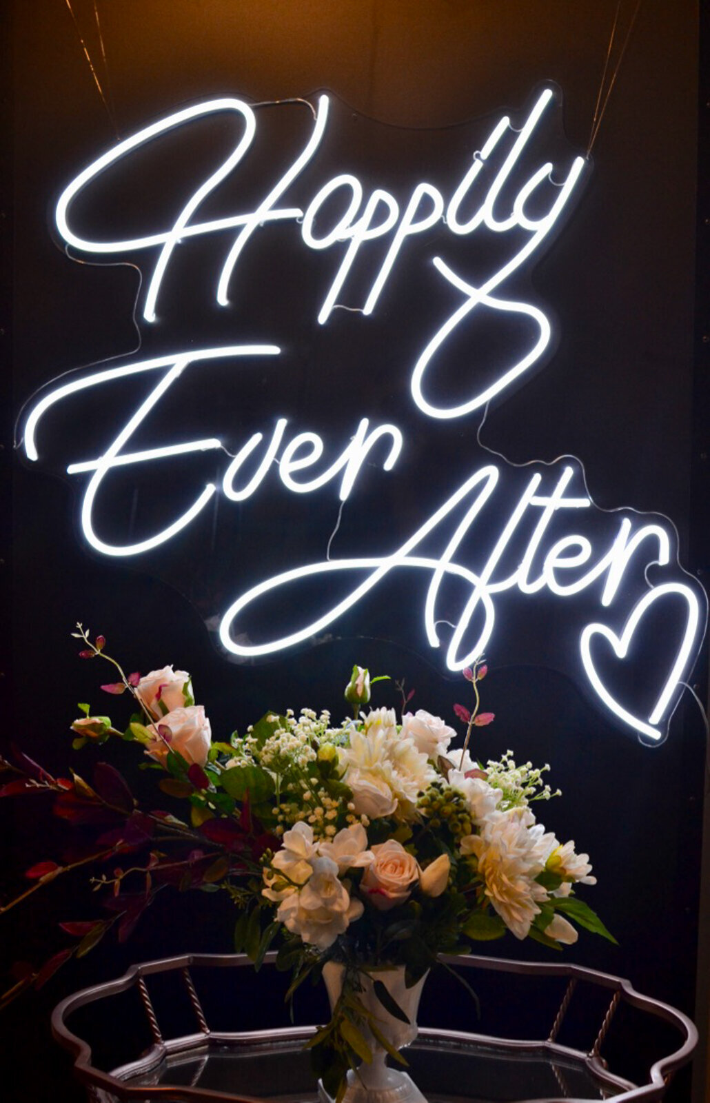 Happily ever after neon sign by Stef Forward Events, trendy and modern decor rentals based in Calgary, AB. Featured on the Brontë Bride Vendor Guide.