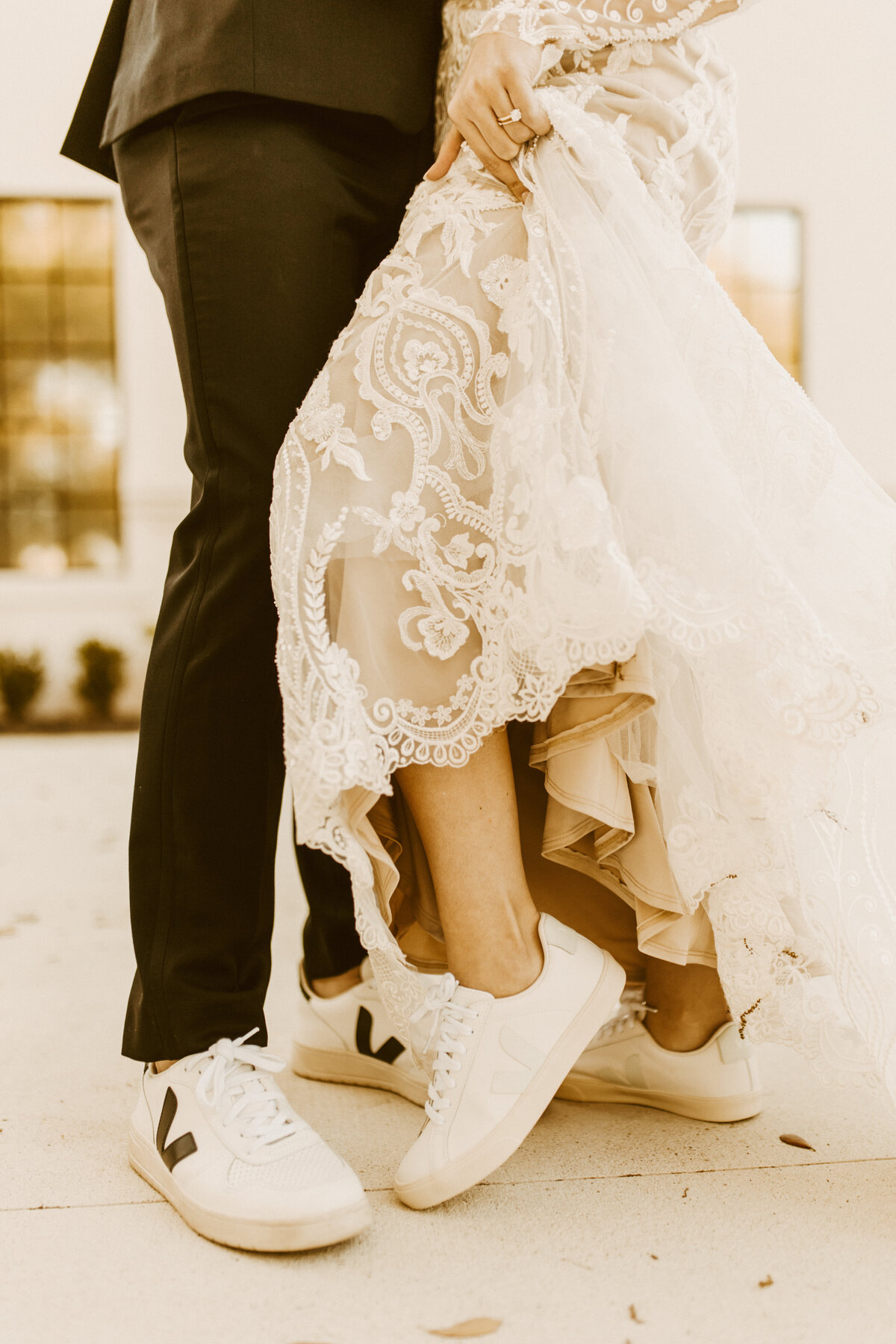 bride and groom with sneakers