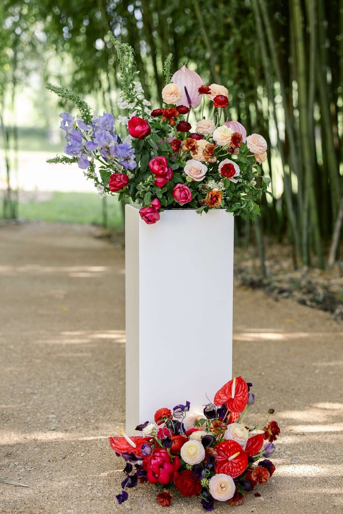 Colorful-floral-arrangements-on-blocks-and-on-the-ground