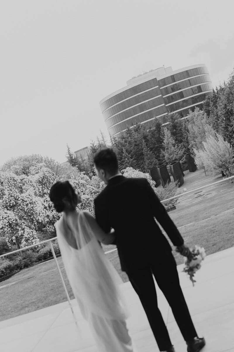 black and white photo of couple looking at each other