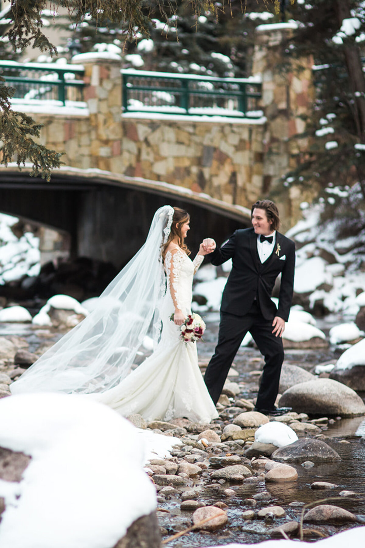Bride and Groom in Vail at the creek