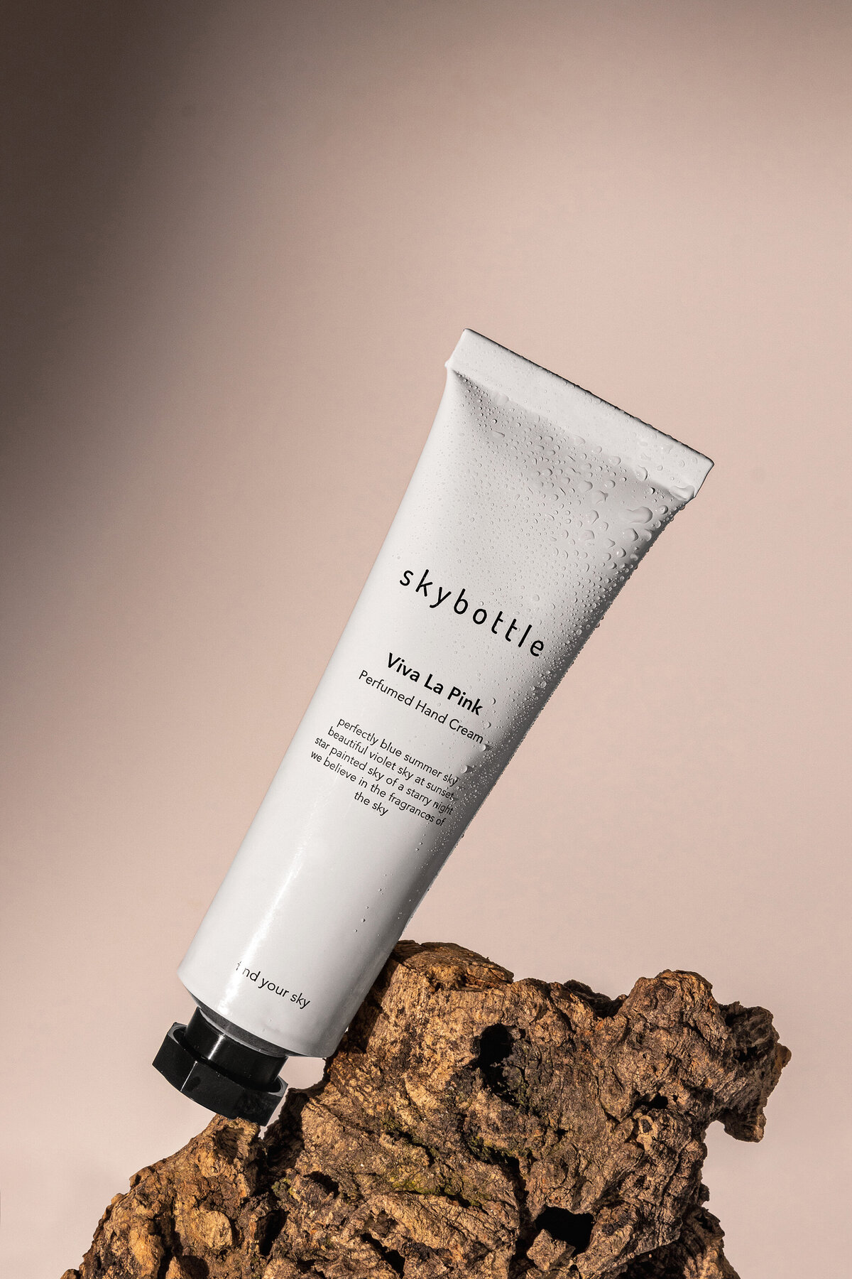 Richmond Virginia wellness photography of hand cream on driftwood ideal for minimalist skincare brands