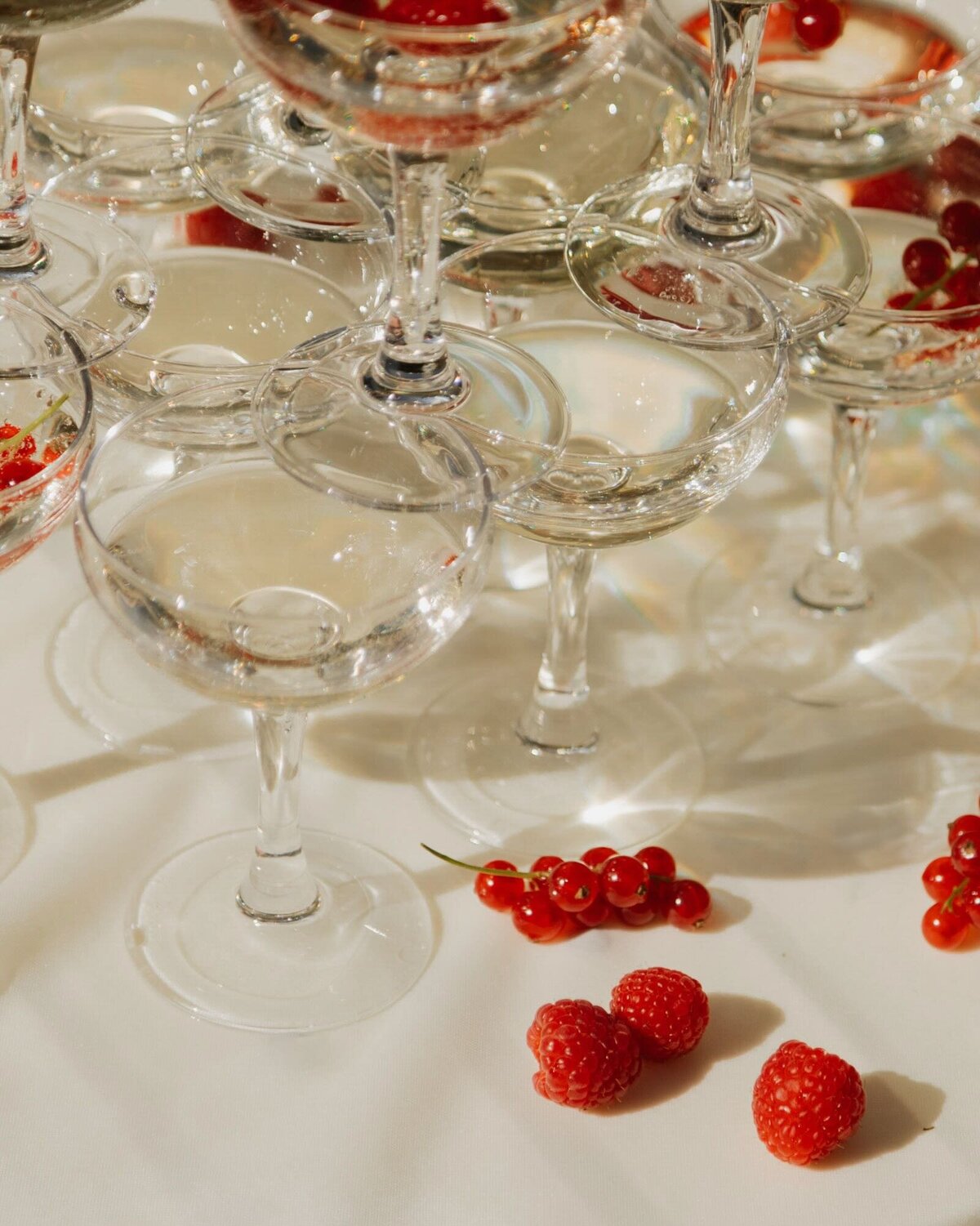 Elegant wedding detail shot of champagne glasses by Wedding Photographer in France