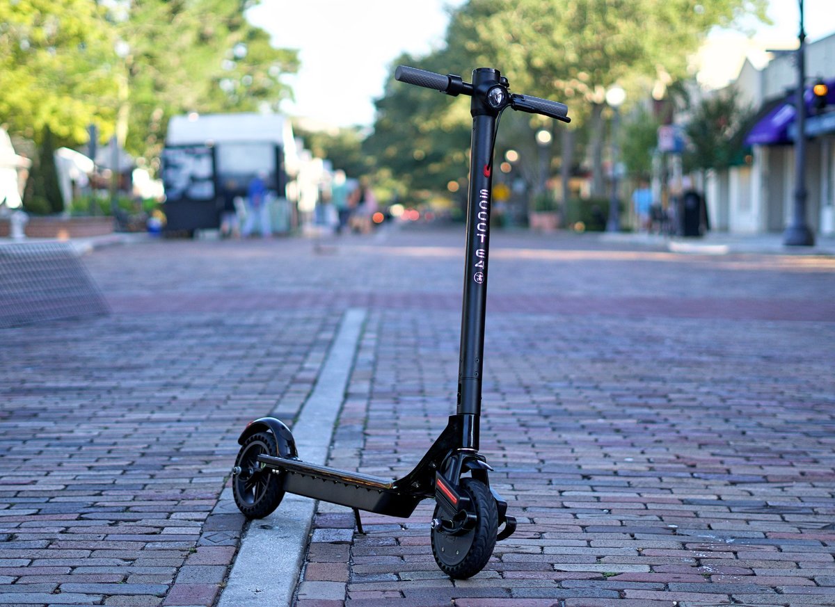 Black Scoot E-4 on brick road