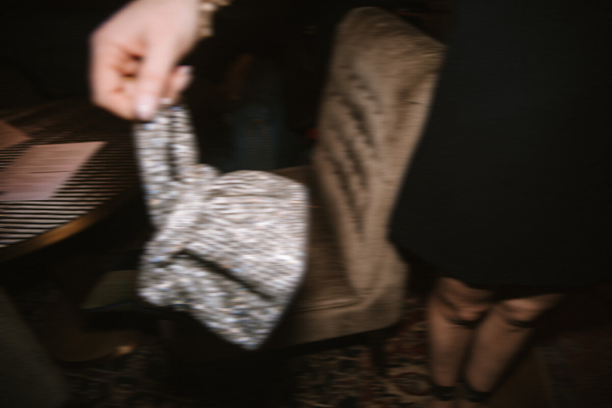 Motion blur of guest's purse