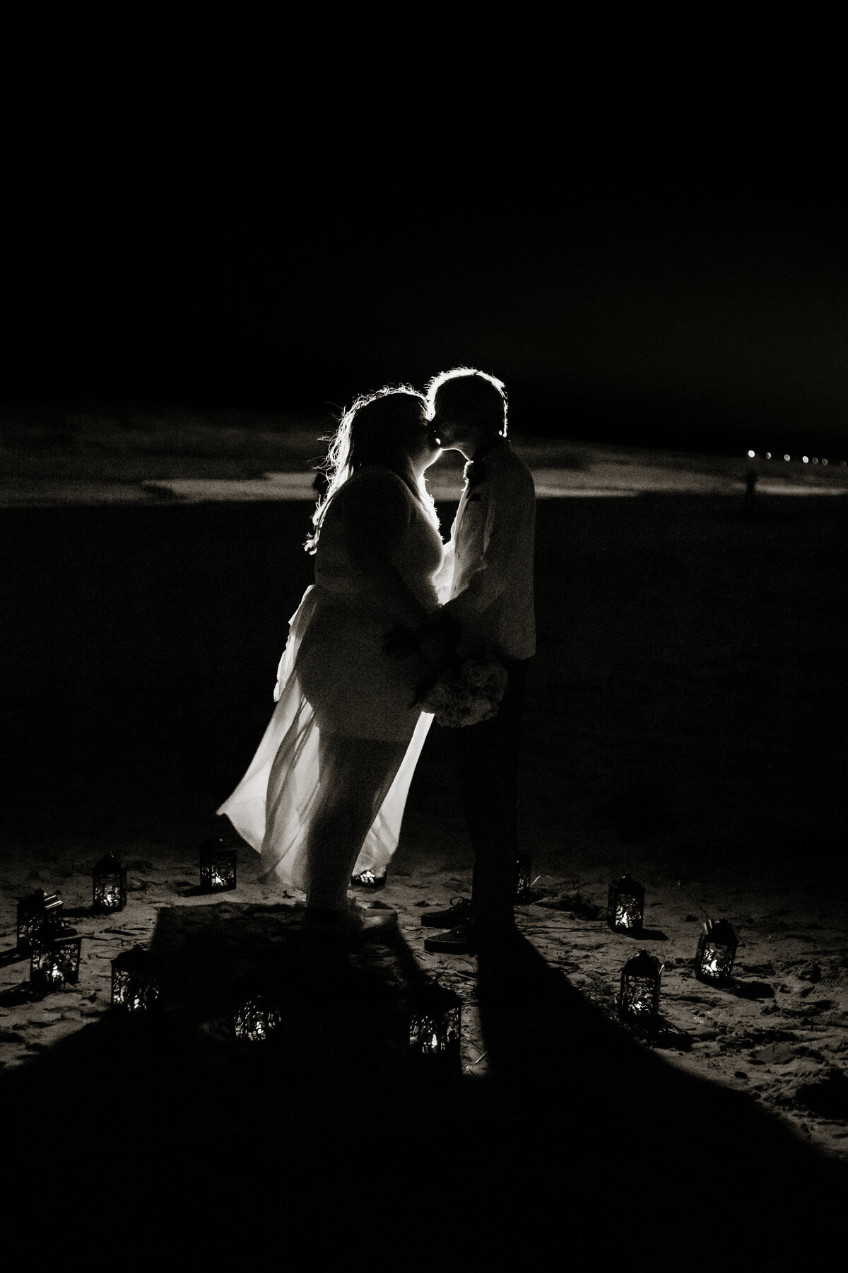 Salem VA wedding and Elopement photographer earthy and moody Charleigh Roberts Photography artsy earthy moody virginia roanoke va east coast enagagment session couples dock water lake candid denim laying on the dock topsail nc wedding beach wedding dark silhouette halloween classy