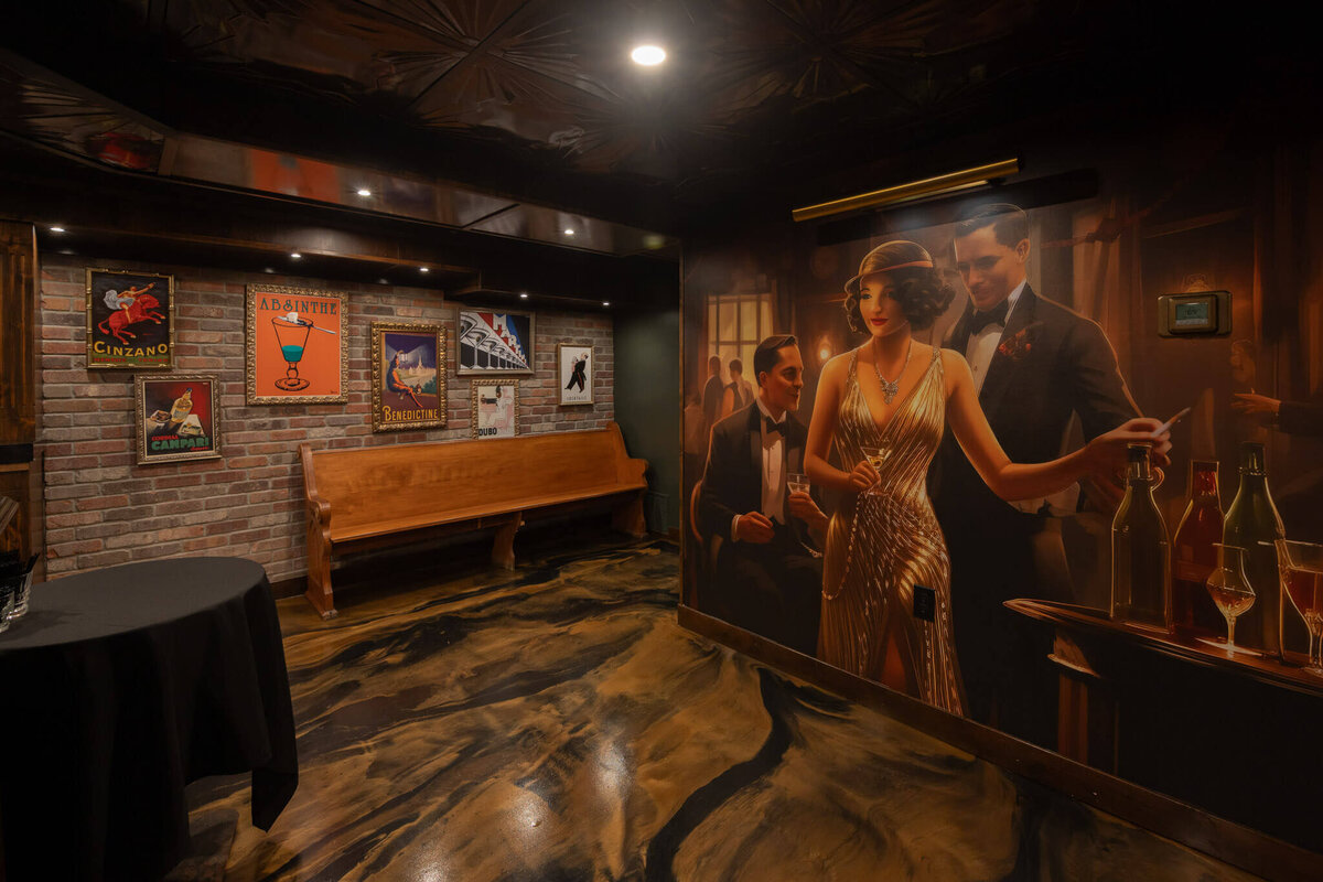 speakeasy basement renovations for restaurant with large wall art