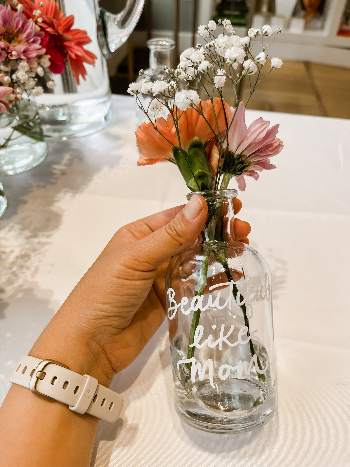 Hand painted calligraphy vases for a jewelry retail activation