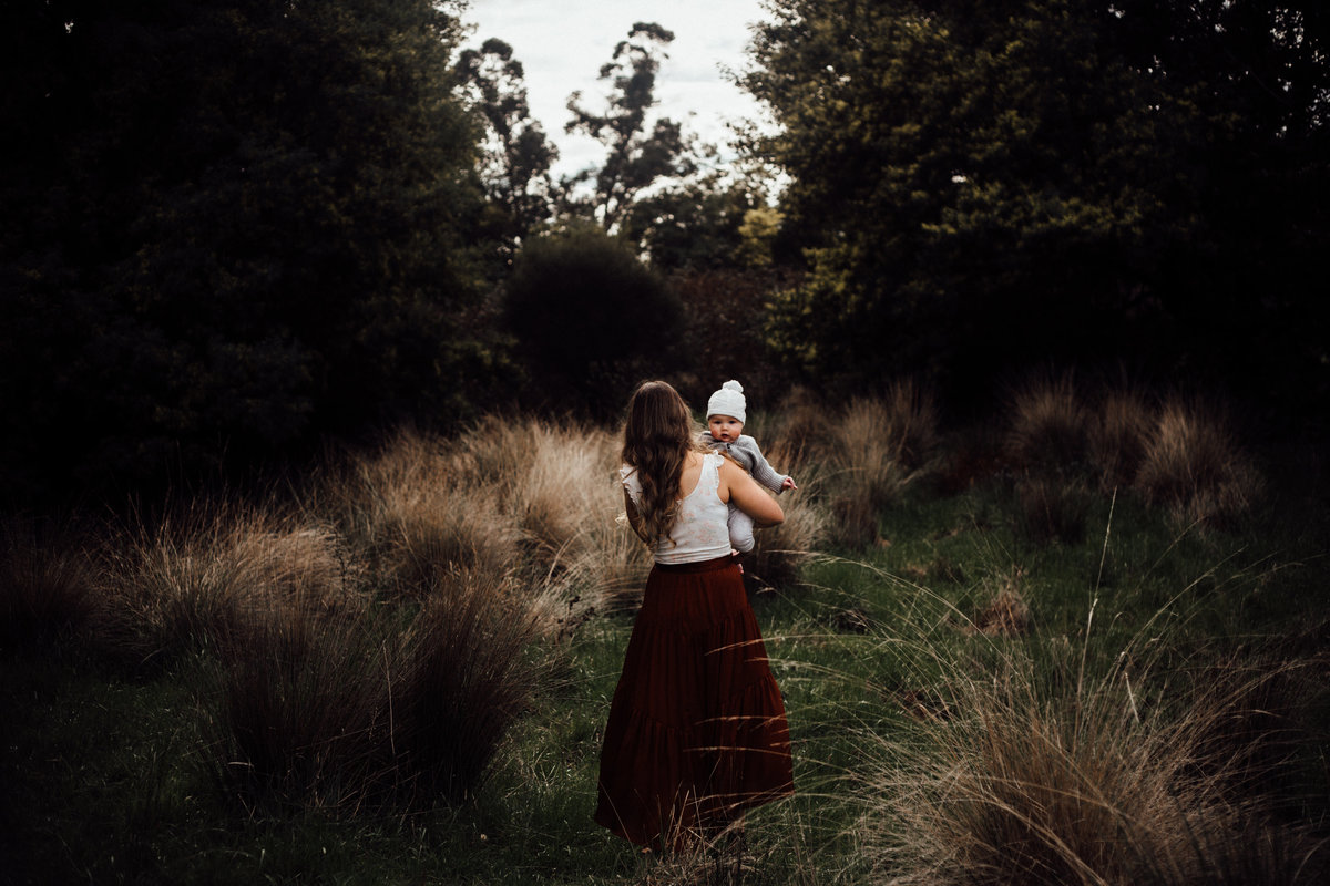Mother and Child in grassy Yarra Glen Field. Melbourne Lifestyle Photographer. Sapphire and Stone Photography.