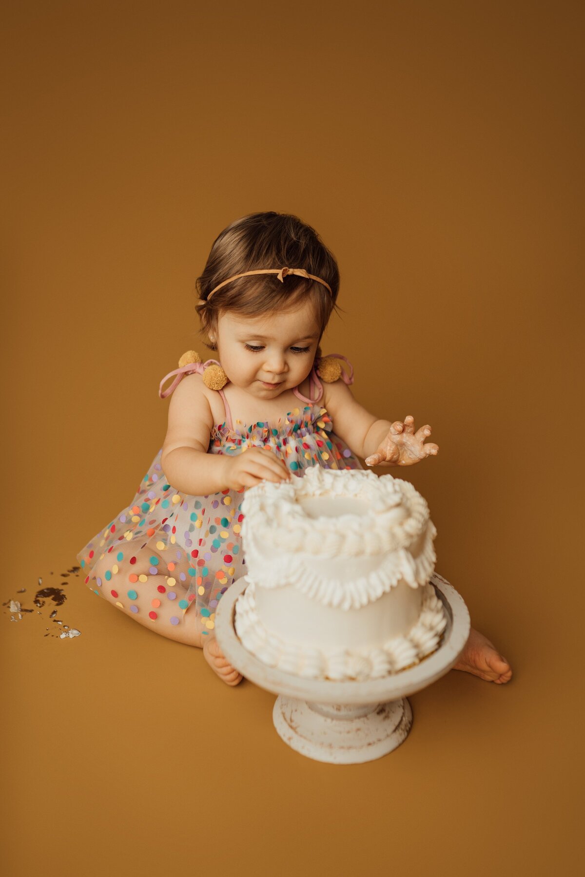 girl during first birthday photo session in Tampa