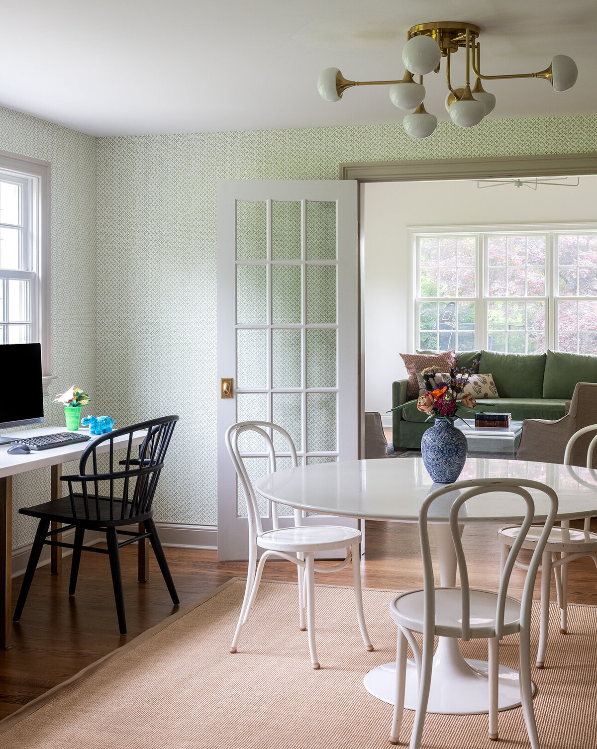 round table with french doors leading to the living room