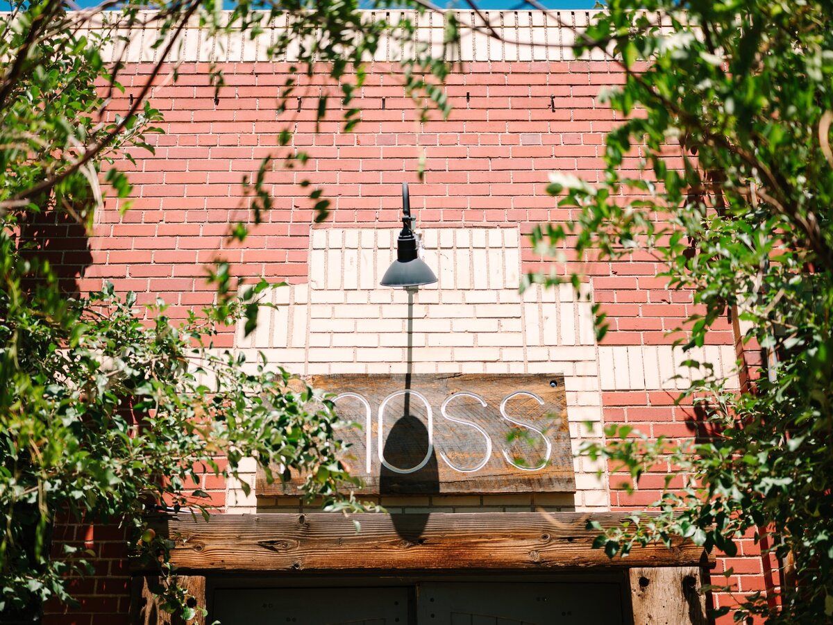 The entrance sign to Moss Denver, a wedding venue in downtown Denver.