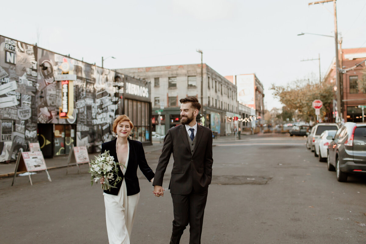 Fort Worth Wedding Photographer Megan Christine Studio captures an alternative couple amidst a vibrant city backdrop. 