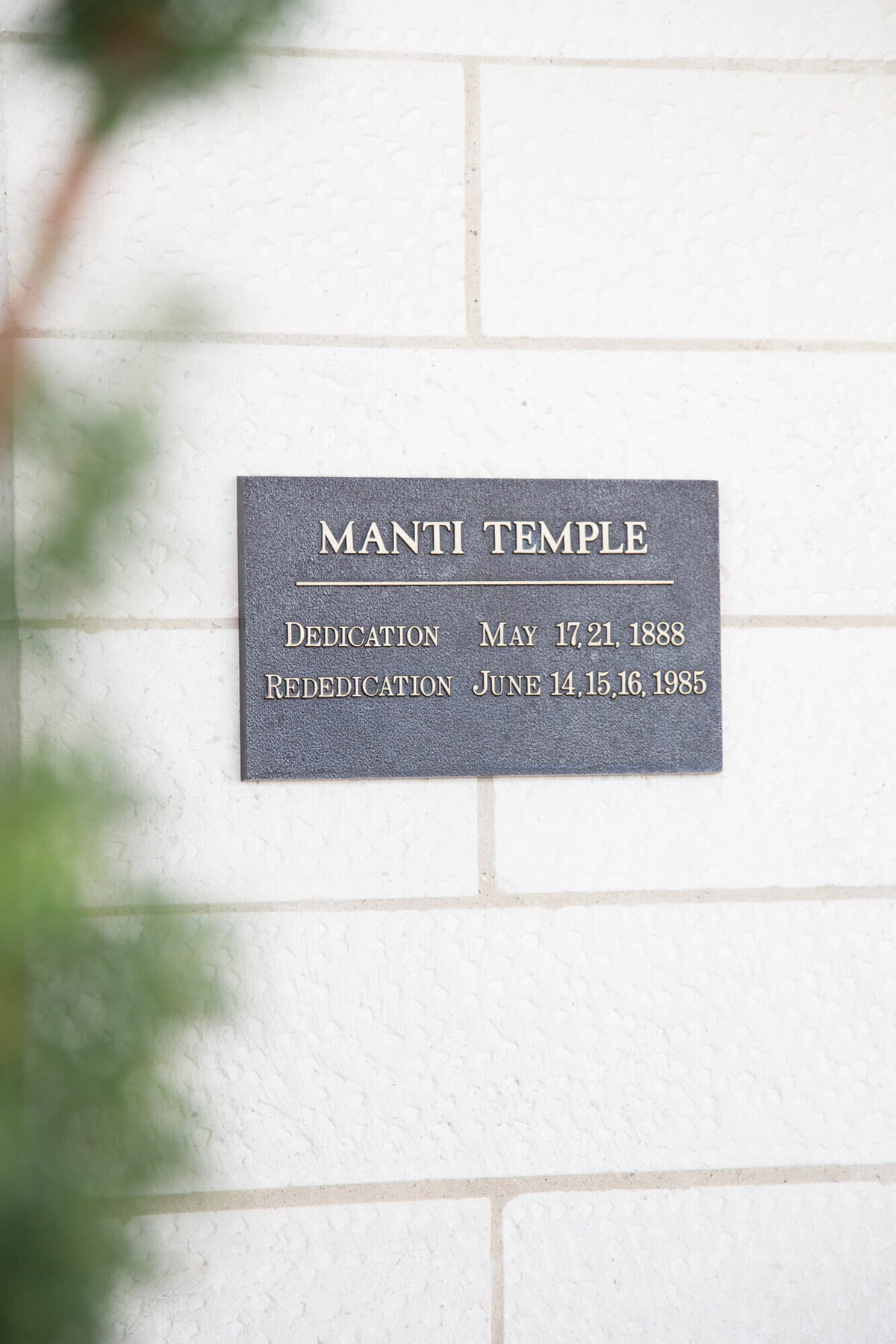 light and airy wedding day detail of Manti Utah lds temple plaque