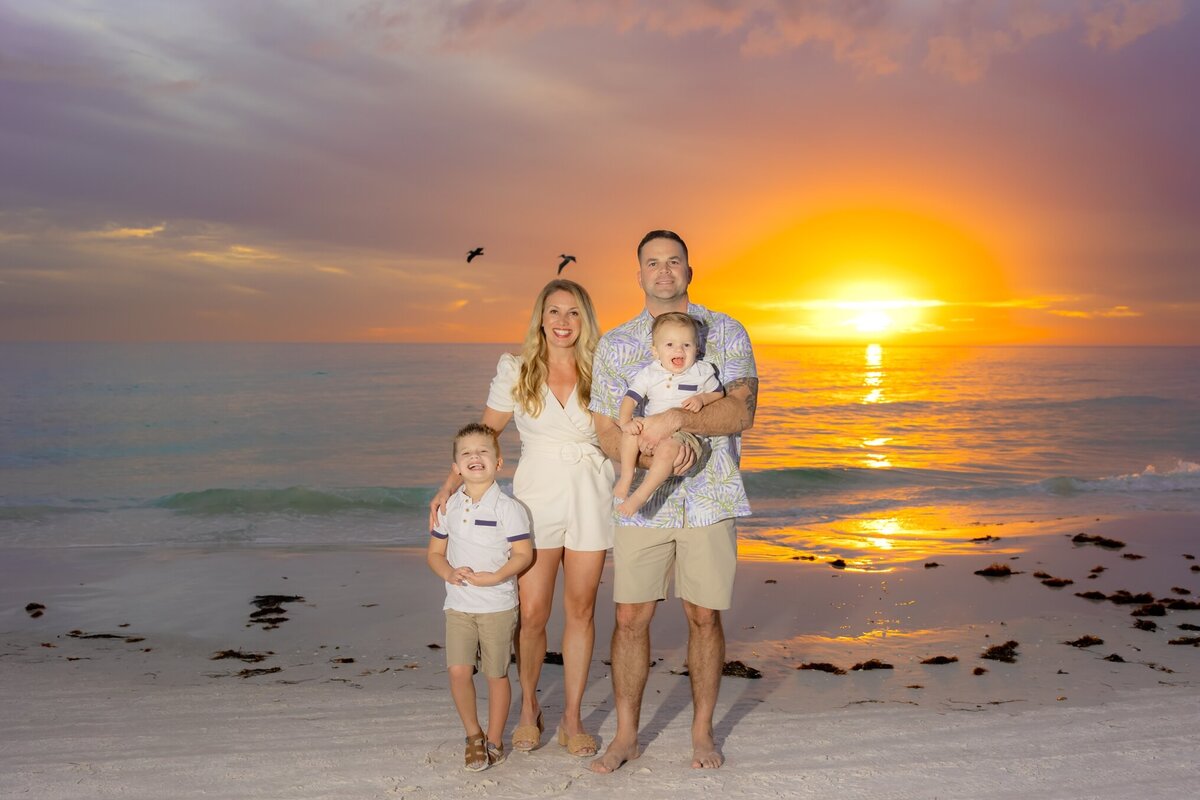 Wide angle family portrait taken by Love and Style Photography at Anna Maria Island