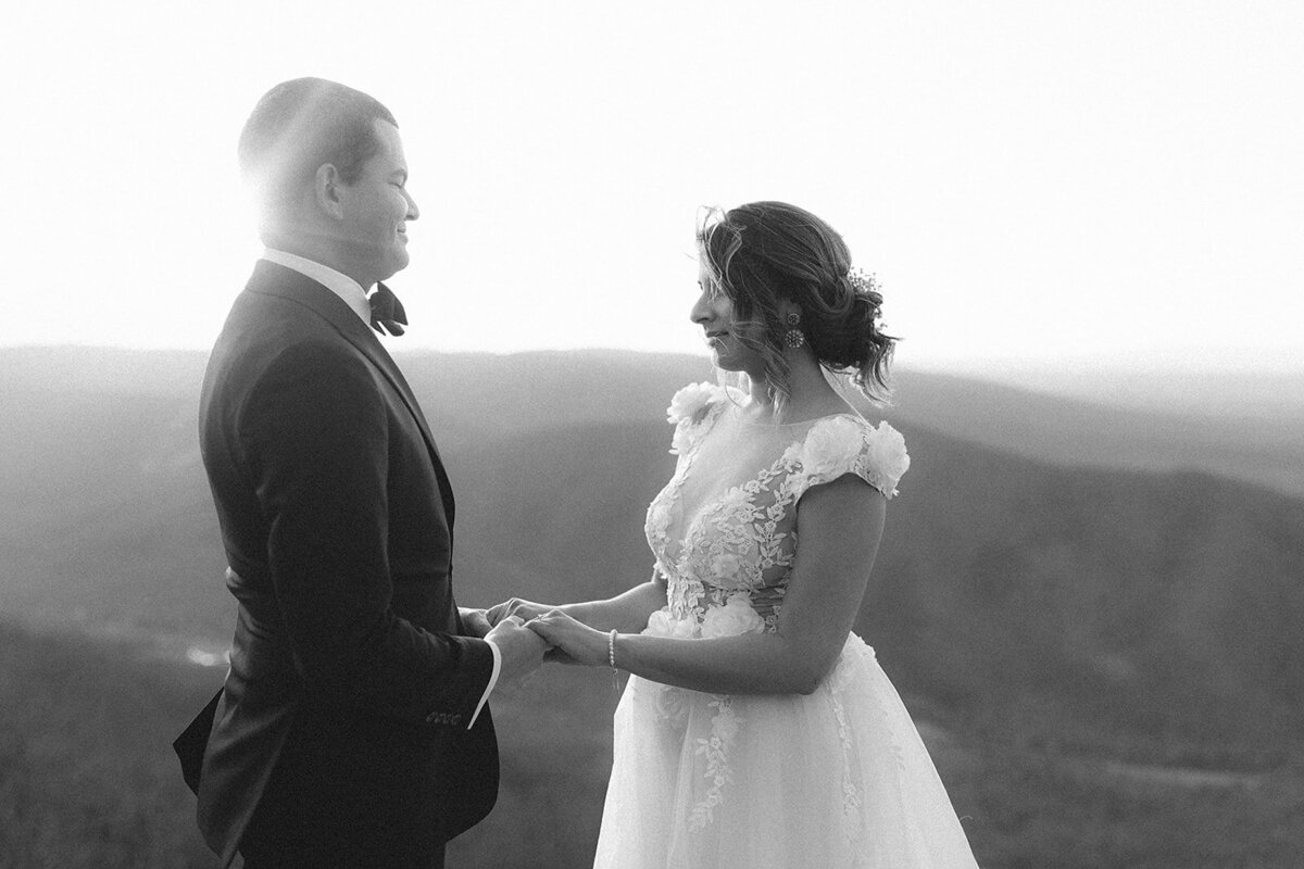 couple standing on Raven's Roost saying their vows Blue Ridge Pkwy