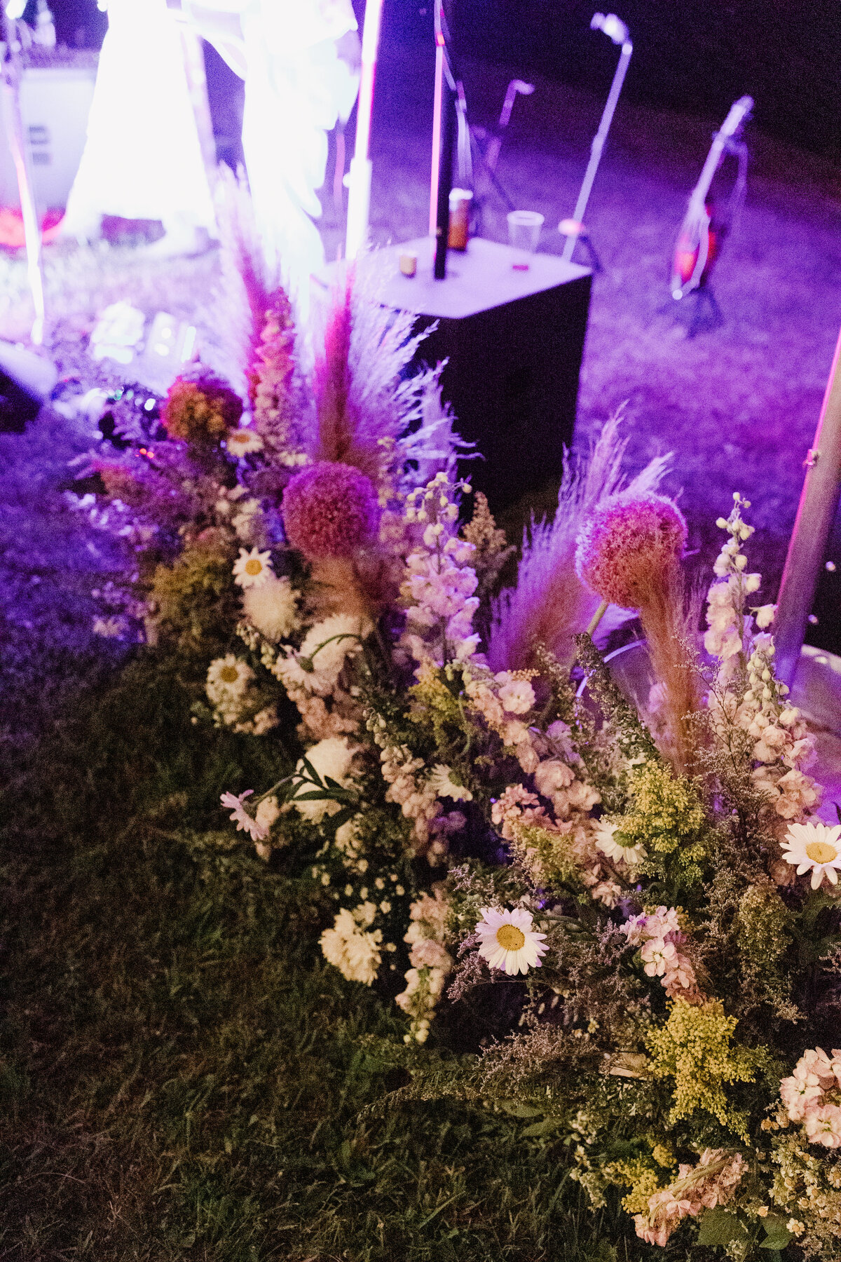 Florals arrangements on the ground at Dallenbach Ranch Wedding Colorado