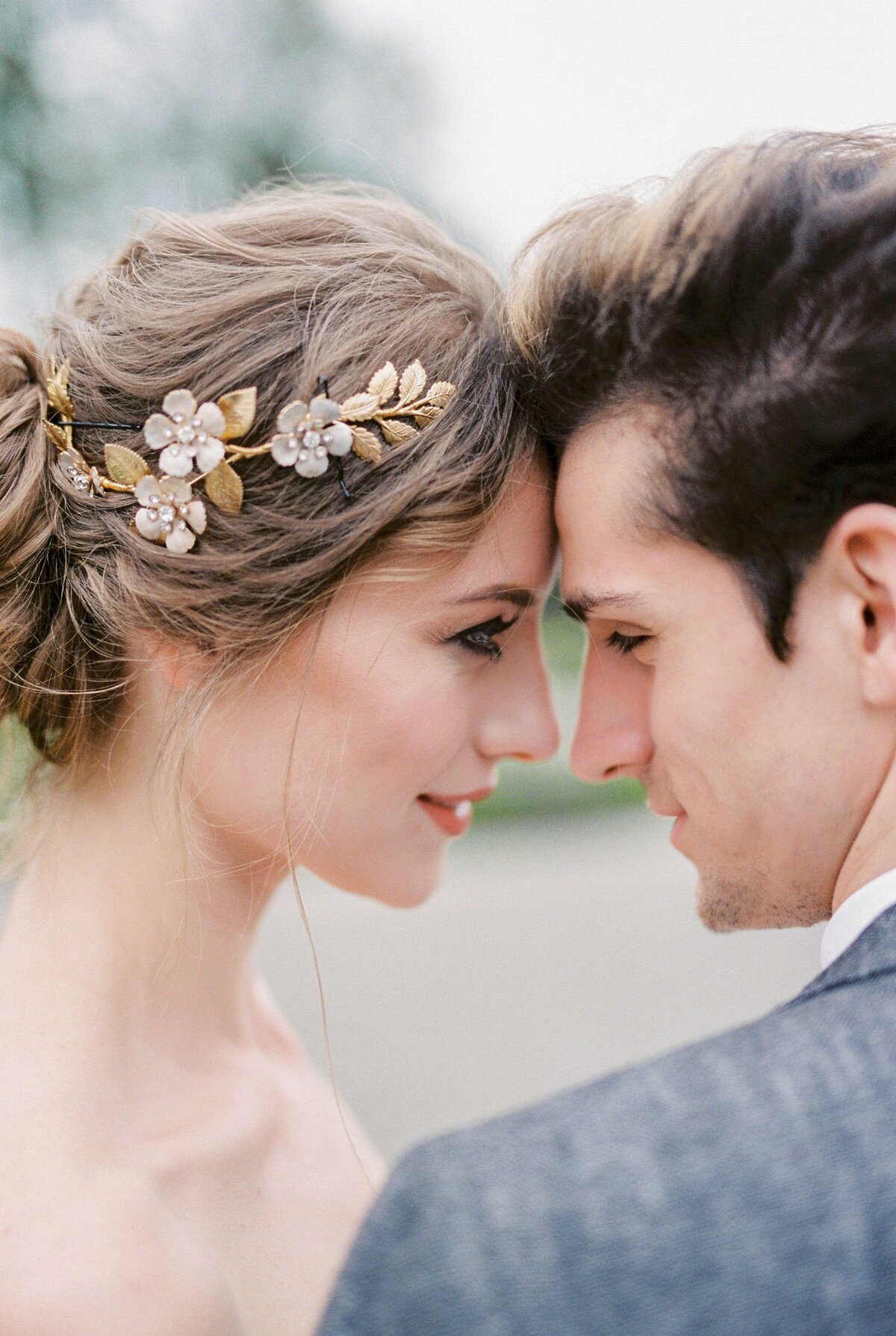 groom-touches-forehead-bride-with-his-forehead-portrait