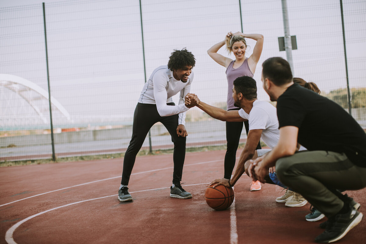group-of-multiethnic-people-playing-basketball-on-2025-02-21-19-41-56-utc