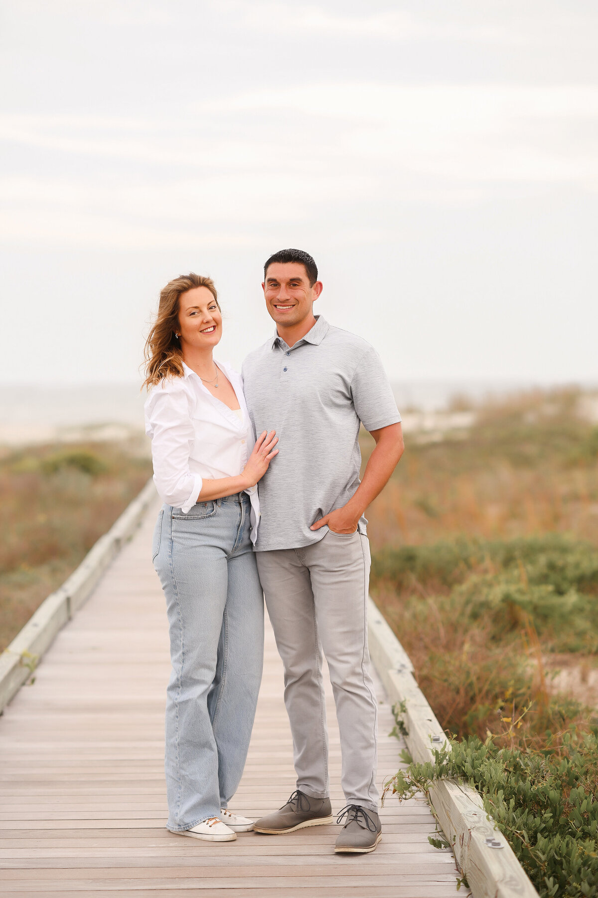Couple poses for portraits during Family Photos on Isle of Palms. 