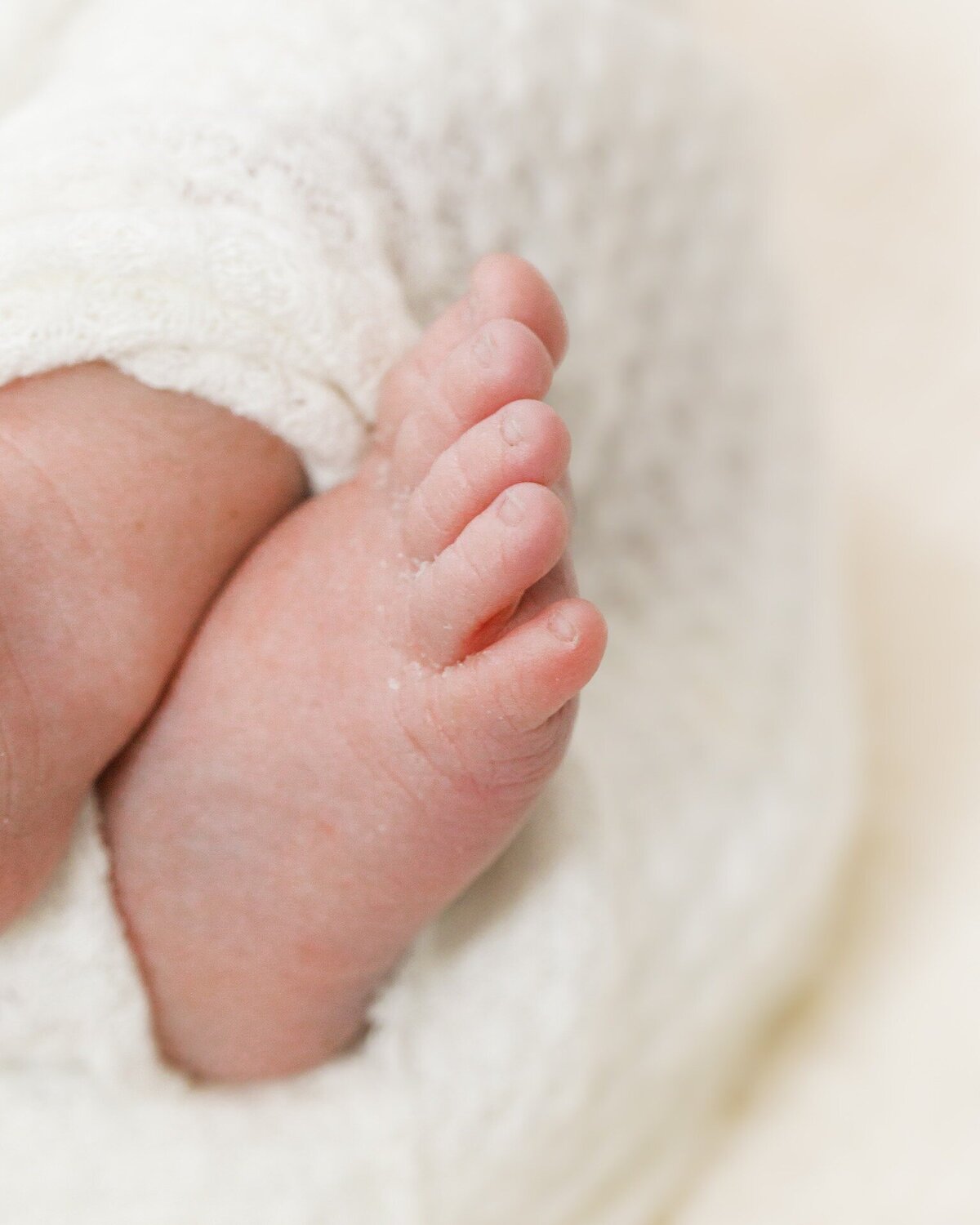 close-up-of-newborn-feet