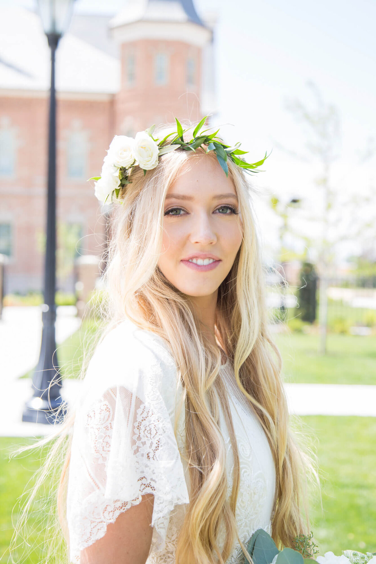 portrait of a blonde bride on lds temple ground