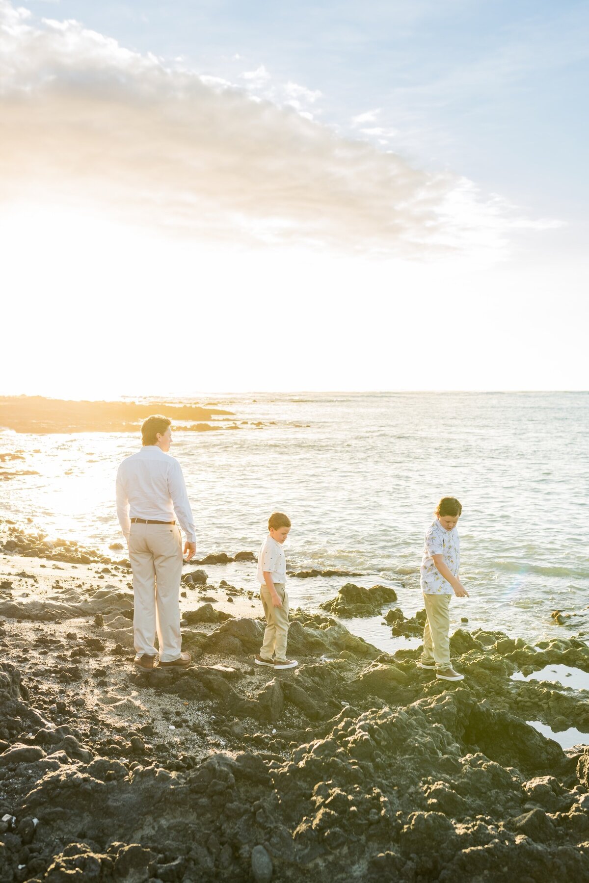 family playing in tide pools Big Island of Hawaii
