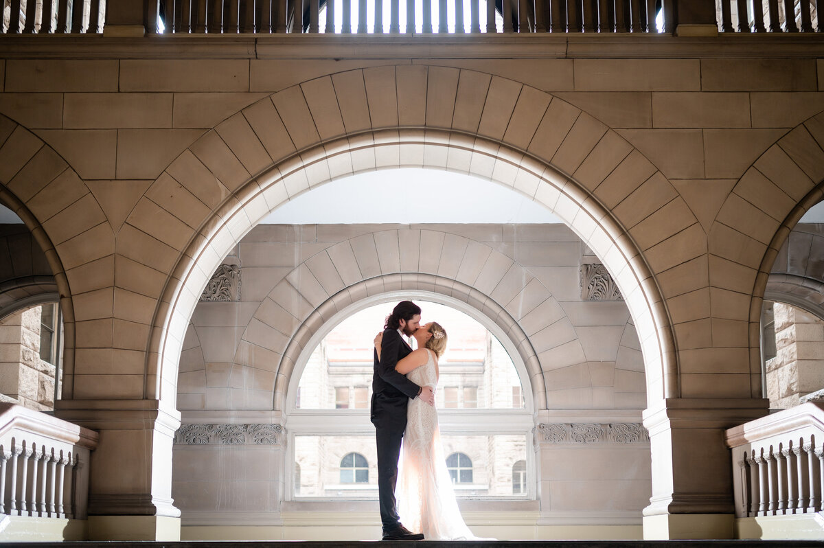 creative wedding picture inside of allegheny county courthouse