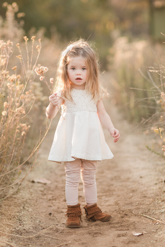 young-girl-in-golden-field--sweetwater-river-bridge-san-diego