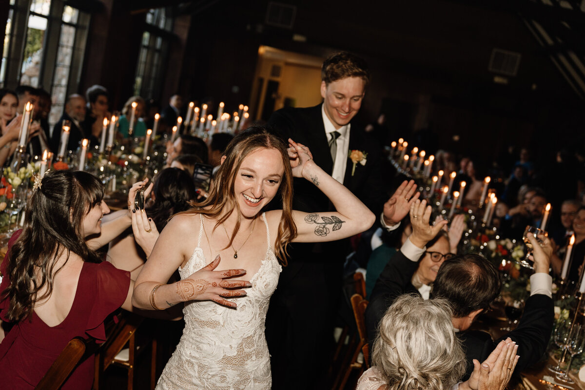 Wedding reception with candlelit tables