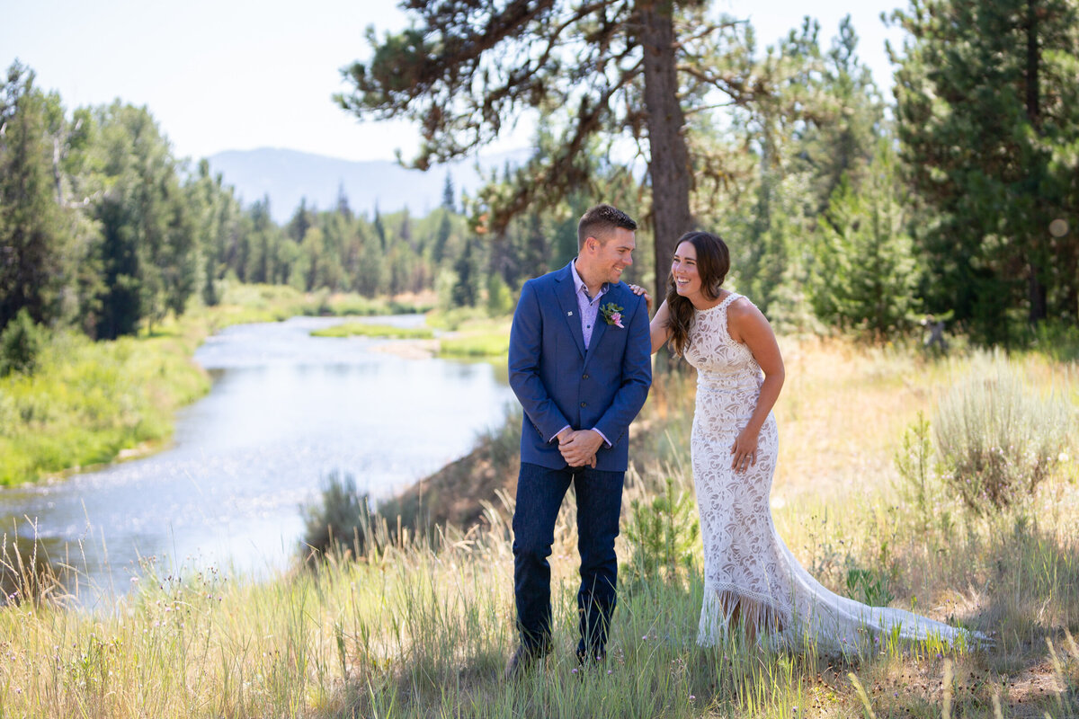A bride walks up behind her groom to surprise him for their first look.
