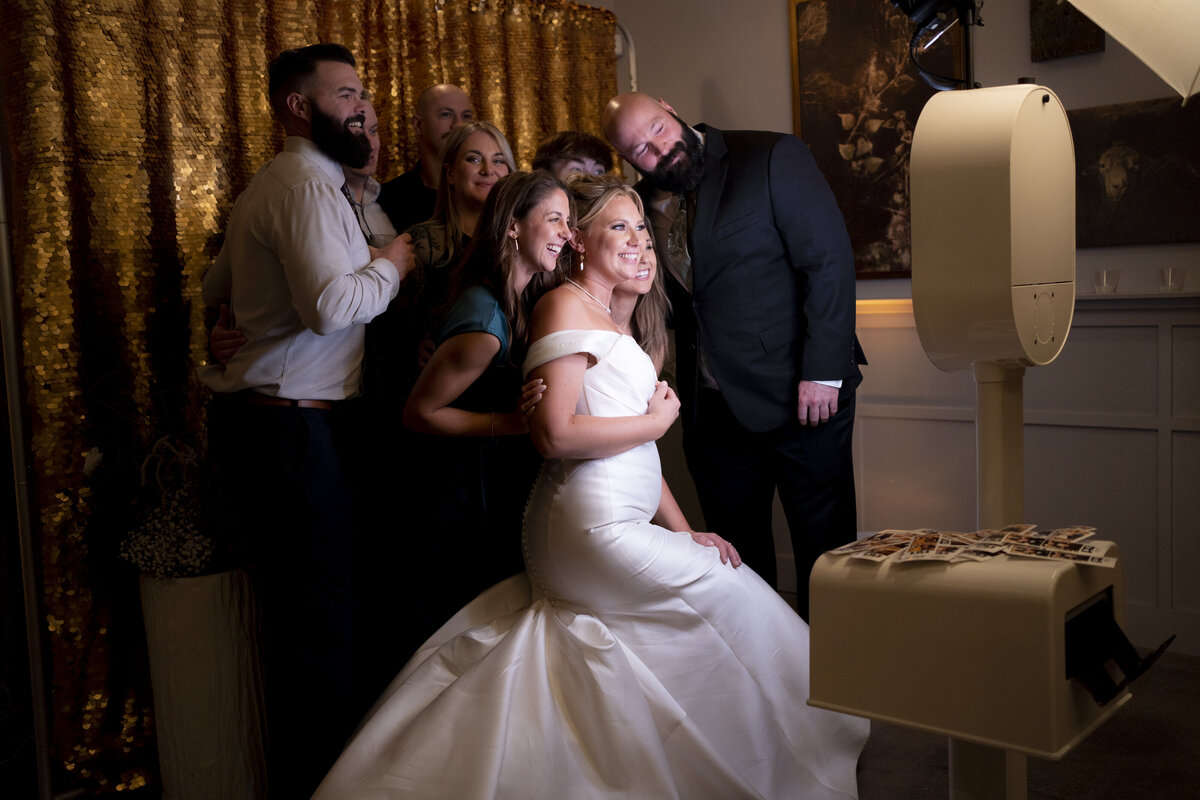 wedding-photo-booth-rental-bridge-groom-group-pose