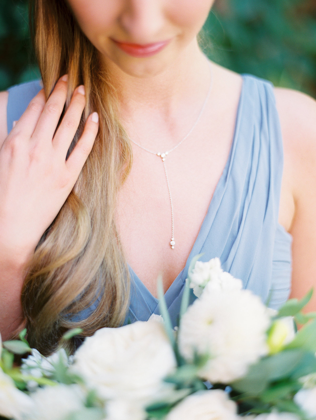 bridesmaid wearing a blue dress