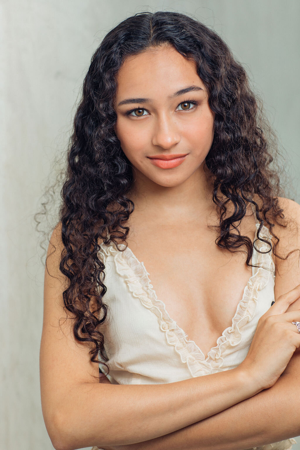 Headshot Photograph Of Young Woman In Light Brown Sleevless Dress Los Angeles